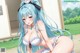 Anime girl with long blue hair wearing a white lingerie.